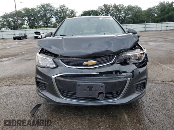 2018 Chevrolet Sonic LS с VIN 1G1JB5SH1J4121041, выставлен на аукционе Copart как лот 64307155 с пробегом 126 610 миль миль и Списание • Salvage title. История ставок и продаж доступна на DreamBid. Изображение 5.