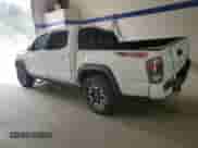 2023 Toyota Tacoma TRD Off Road z VIN 3TMCZ5AN5PM625110, wystawiony jako Copart lot #82304995 z przebiegiem 48 416 mil mil oraz Szkoda całkowita • Salvage title. Historia ofert i sprzedaży dostępna na DreamBid. Obrazek 2.