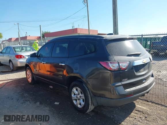 2016 Chevrolet Traverse LS z VIN 1GNKRFED6GJ147013, wystawiony jako IAAI lot #43101469 z przebiegiem 123 006 mil mil oraz . Historia ofert i sprzedaży dostępna na DreamBid. Obrazek 14.