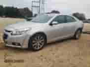 2016 Chevrolet Malibu LTZ with VIN 1G11E5SA7GF137428, listed as a Copart auction lot 79163314 with 167,135 mi miles and Salvage title. Bid and sale history available at DreamBid. Image 1.