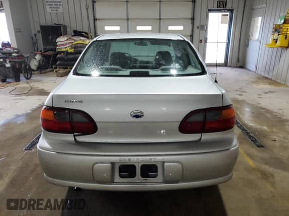 2005 Chevrolet Malibu Classic z VIN 1G1ND52F45M228522, wystawiony jako Copart lot #50364125 z przebiegiem 121 219 mil mil oraz Szkoda całkowita • Salvage title. Historia ofert i sprzedaży dostępna na DreamBid. Obrazek 6.