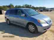 2009 Honda Odyssey EX with VIN 5FNRL38479B008571, listed as a Copart auction lot 86294855 with 98,356 mi miles and Salvage title. Bid and sale history available at DreamBid. Image 4.