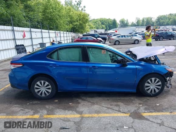 2019 Toyota Camry Hybrid LE с VIN 4T1B31HK6KU006419, выставлен на аукционе IAAI как лот 42678278 с пробегом Не указан миль и . История ставок и продаж доступна на DreamBid. Изображение 13.