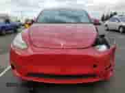 2023 Tesla Model Y Long Range z VIN 7SAYGDEE8PA113314, wystawiony jako Copart lot #80321355 z przebiegiem 15 710 mil mil oraz Szkoda całkowita • Salvage title. Historia ofert i sprzedaży dostępna na DreamBid. Obrazek 5.
