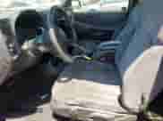 2000 Chevrolet Blazer LS with VIN 1GNCS18W6YK138400, listed as a Copart auction lot 60550575 with 166,872 mi miles and Salvage title. Bid and sale history available at DreamBid. Image 7.