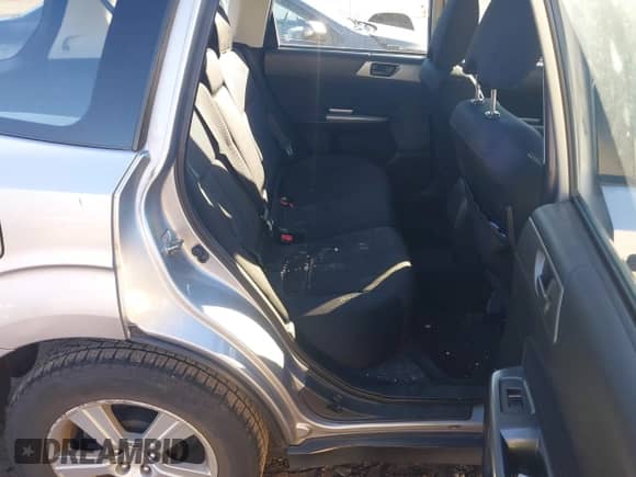 2012 Subaru Forester X z VIN JF2SHABC8CH409577, wystawiony jako IAAI lot #43490487 z przebiegiem 143 372 mil mil oraz . Historia ofert i sprzedaży dostępna na DreamBid. Obrazek 8.