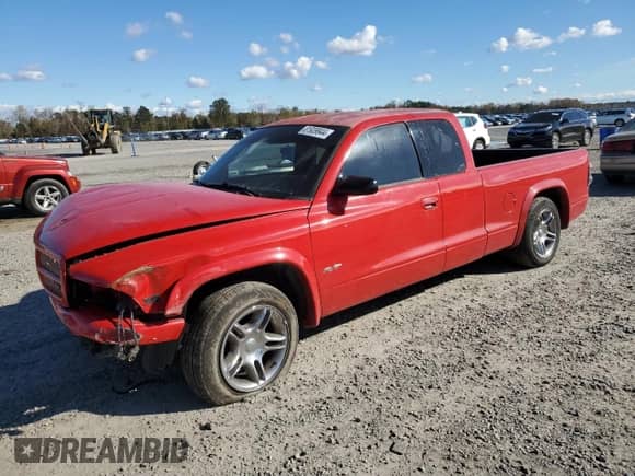 2000 Dodge Dakota Sport with VIN 1B7GL22Z1YS589119, listed as a Copart auction lot 81939944 with 144,952 mi miles and Salvage title. Bid and sale history available at DreamBid. Image 1.