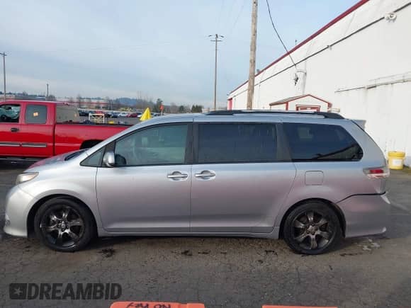 2011 Toyota Sienna SE with VIN 5TDXK3DC4BS070311, listed as a IAAI auction lot 41379741 with 138,589 mi miles and . Bid and sale history available at DreamBid. Image 14.