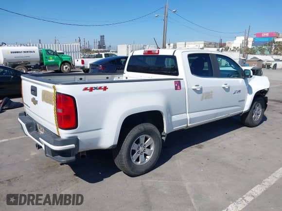 2020 Chevrolet Colorado 4WD Work Truck with VIN 1GCGTBEN4L1243119, listed as a IAAI auction lot 43017977 with 142,459 mi miles and . Bid and sale history available at DreamBid. Image 4.