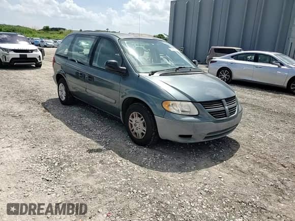 2007 Dodge Caravan SE with VIN 1D4GP25B07B207943, listed as a Copart auction lot 70453295 with 187,629 mi miles and Salvage title. Bid and sale history available at DreamBid. Image 14.