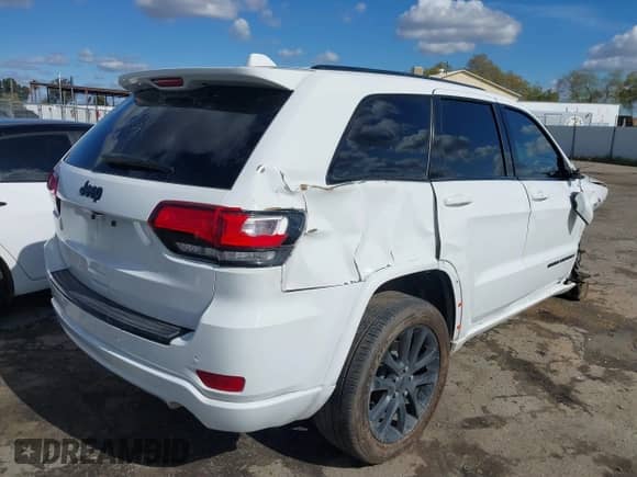 2018 Jeep Grand Cherokee Laredo E with VIN 1C4RJEAG4JC193539, listed as a IAAI auction lot 41827154 with 79,784 mi miles and . Bid and sale history available at DreamBid. Image 4.