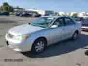 2002 Toyota Camry LE with VIN 4T1BE32K42U552229, listed as a Copart auction lot 84379825 with 258,234 mi miles and Salvage title. Bid and sale history available at DreamBid. Image 1.