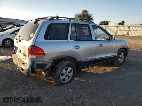 2005 Hyundai Santa Fe GLS z VIN KM8SC13E05U965000, wystawiony jako Copart lot #90371345 z przebiegiem 196 885 mil mil oraz Szkoda całkowita • Salvage title. Historia ofert i sprzedaży dostępna na DreamBid. Obrazek 3.