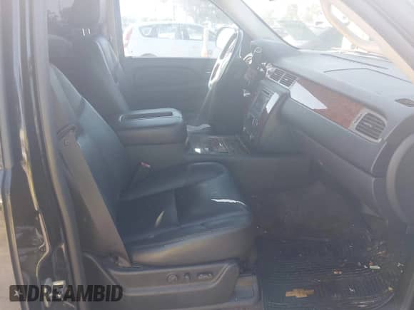 2009 Chevrolet Tahoe LTZ with VIN 1GNFC33089R297033, listed as a IAAI auction lot 42850828 with 310,614 mi miles and . Bid and sale history available at DreamBid. Image 5.