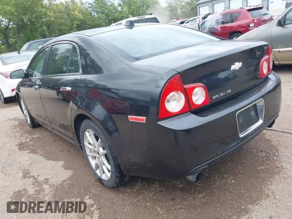 2012 Chevrolet Malibu LTZ z VIN 1G1ZG5E7XCF212629, wystawiony jako IAAI lot #43031213 z przebiegiem 194 958 mil mil oraz . Historia ofert i sprzedaży dostępna na DreamBid. Obrazek 3.