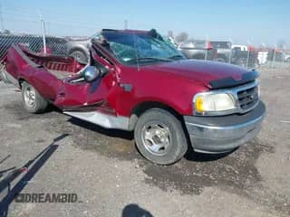 2003 Ford F-150 XL z VIN 1FTRF17W63NA02400, wystawiony jako IAAI lot #41752364 z przebiegiem 209 947 mil mil oraz . Historia ofert i sprzedaży dostępna na DreamBid. Obrazek 1.