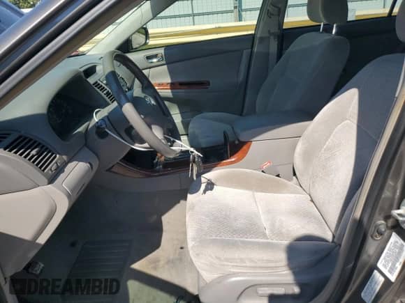 2003 Toyota Camry LE with VIN 4T1BE32K03U726024, listed as a Copart auction lot 84419085 with 129,574 mi miles and Clean title. Bid and sale history available at DreamBid. Image 7.