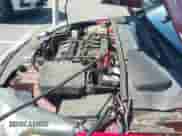 2014 Ford Focus Titanium z VIN 1FADP3N24EL158443, wystawiony jako IAAI lot #42801477 z przebiegiem 116 859 mil mil oraz . Historia ofert i sprzedaży dostępna na DreamBid. Obrazek 12.