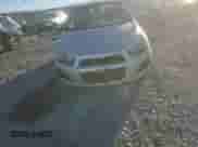2012 Chevrolet Sonic LS z VIN 1G1JB5SH2C4152334, wystawiony jako Copart lot #46574475 z przebiegiem 145 396 mil mil oraz Szkoda całkowita • Salvage title. Historia ofert i sprzedaży dostępna na DreamBid. Obrazek 11.