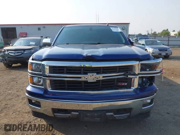 2014 Chevrolet Silverado 1500 LT z VIN 3GCUKREC9EG155264, wystawiony jako IAAI lot #43184341 z przebiegiem 131 625 mil mil oraz . Historia ofert i sprzedaży dostępna na DreamBid. Obrazek 12.