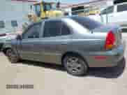2005 Hyundai Accent GLS z VIN KMHCG45C55U608336, wystawiony jako IAAI lot #42743218 z przebiegiem 221 254 mil mil oraz . Historia ofert i sprzedaży dostępna na DreamBid. Obrazek 14.