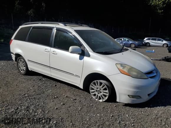 2010 Toyota Sienna XLE с VIN 5TDDK4CC8AS031049, выставлен на аукционе Copart как лот 80094555 с пробегом 200 309 миль миль и Списание • Salvage title. История ставок и продаж доступна на DreamBid. Изображение 4.