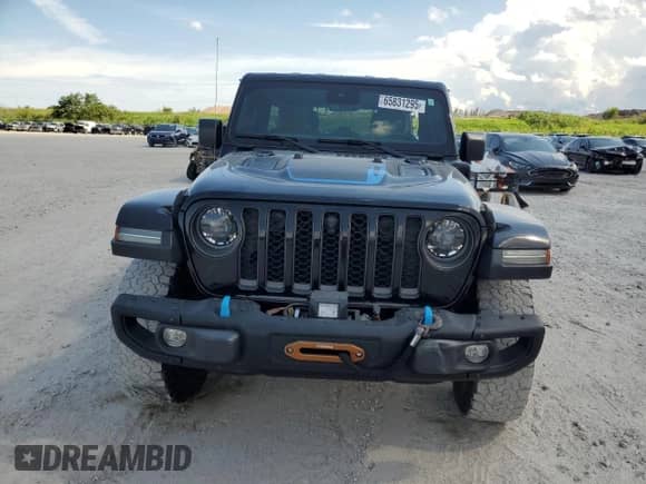 2023 Jeep Wrangler Rubicon with VIN 1C4JJXR68PW502926, listed as a Copart auction lot 65831295 with 36,959 mi miles and Salvage title. Bid and sale history available at DreamBid. Image 5.