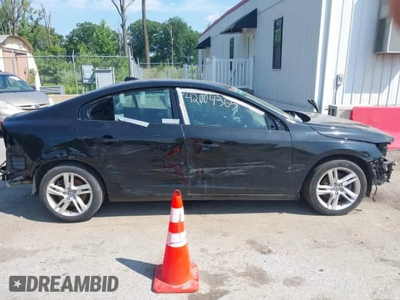 2015 Volvo S60 T5 Drive-E Premier with VIN YV140MFK6F1346875, listed as a IAAI auction lot 42004365 with 98,574 mi miles and . Bid and sale history available at DreamBid. Image 14.