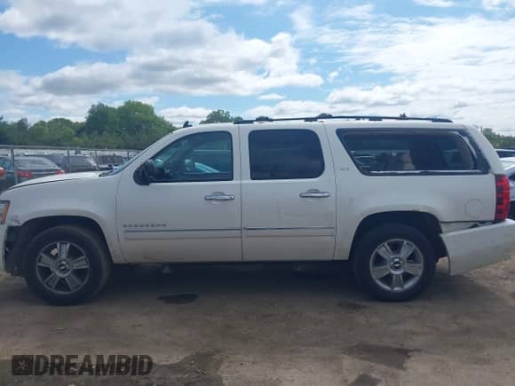 2010 Chevrolet Suburban LTZ with VIN 1GNUKKE36AR273474, listed as a IAAI auction lot 42331221 with 180,504 mi miles and . Bid and sale history available at DreamBid. Image 14.