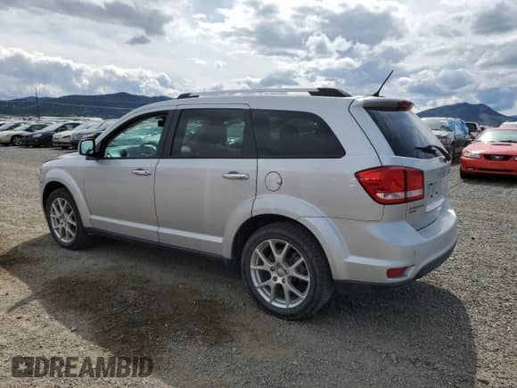 2013 Dodge Journey R/T with VIN 3C4PDDFG4DT631373, listed as a Copart auction lot 59044235 with 163,078 mi miles and Salvage title. Bid and sale history available at DreamBid. Image 2.