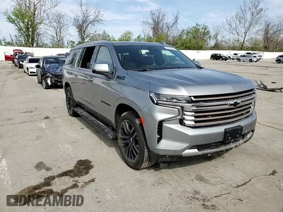 2023 Chevrolet Suburban High Country z VIN 1GNSKGKL5PR296245, wystawiony jako Copart lot #52997085 z przebiegiem 6 548 mil mil oraz Szkoda całkowita • Salvage title. Historia ofert i sprzedaży dostępna na DreamBid. Obrazek 11.