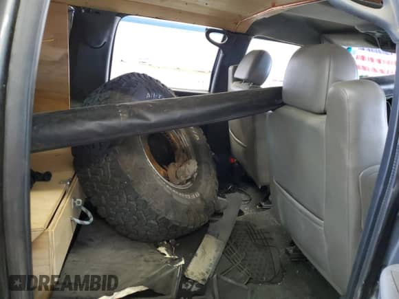 2000 Chevrolet Suburban LT с VIN 3GNFK16T7YG202893, выставлен на аукционе Copart как лот 66367775 с пробегом 164 910 миль миль и Списание • Salvage title. История ставок и продаж доступна на DreamBid. Изображение 11.