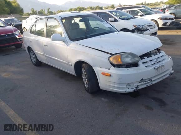 2003 Hyundai Accent GL z VIN KMHCG45C63U463420, wystawiony jako IAAI lot #42356069 z przebiegiem 97 083 mil mil oraz . Historia ofert i sprzedaży dostępna na DreamBid. Obrazek 1.