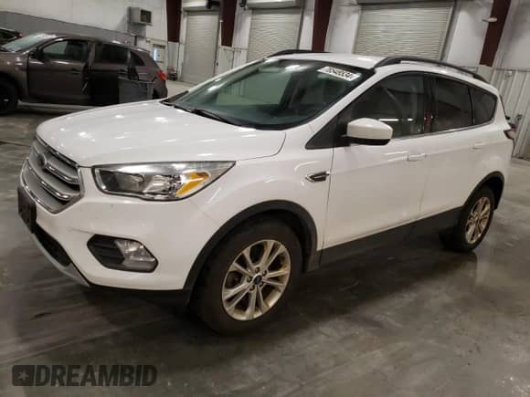 2018 Ford Escape SE with VIN 1FMCU9GD6JUC77191, listed as a Copart auction lot 78548534 with 59,360 mi miles and Salvage title. Bid and sale history available at DreamBid. Image 1.