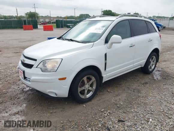 2012 Chevrolet Captiva Sport LTZ with VIN 3GNFL4E54CS654050, listed as a IAAI auction lot 42130624 with 99,792 mi miles and . Bid and sale history available at DreamBid. Image 2.