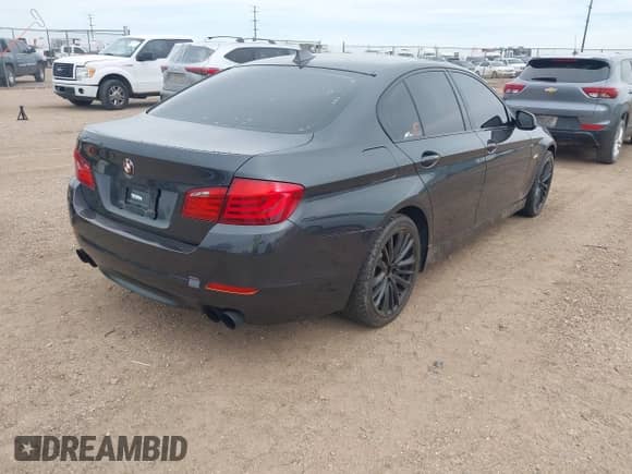2011 BMW 5 Series 550i with VIN WBAFR9C53BC618293, listed as a IAAI auction lot 42641838 with 141,254 mi miles and . Bid and sale history available at DreamBid. Image 4.