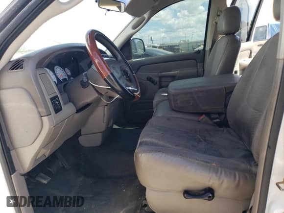 2003 Dodge 1500 ST with VIN 1D7HA18K03J582326, listed as a Copart auction lot 53682044 with 148,564 mi miles and Salvage title. Bid and sale history available at DreamBid. Image 7.