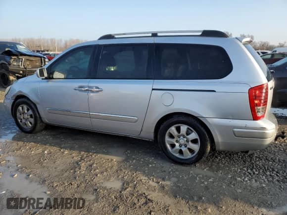 2007 Hyundai Entourage GLS с VIN KNDMC233876026198, выставлен на аукционе Copart как лот 82776623 с пробегом 161 071 миль миль и Списание • Salvage title. История ставок и продаж доступна на DreamBid. Изображение 2.
