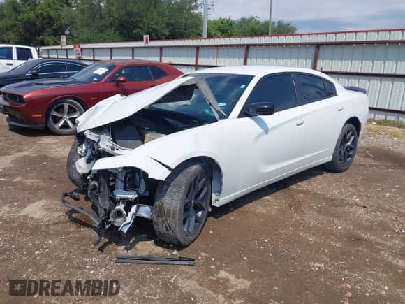2020 Dodge Charger SXT with VIN 2C3CDXBG7LH208711, listed as a IAAI auction lot 43028429 with Not provided miles and . Bid and sale history available at DreamBid. Image 18.
