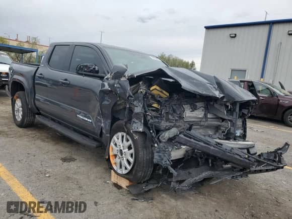 2024 Toyota Tacoma SR5 with VIN 3TMLB5JN0RM071045, listed as a Copart auction lot 70163855 with 8,616 mi miles and Salvage title. Bid and sale history available at DreamBid. Image 4.