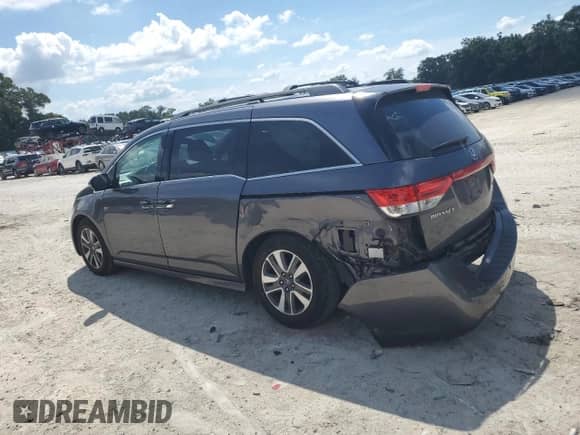 2016 Honda Odyssey Touring Elite z VIN 5FNRL5H94GB024134, wystawiony jako Copart lot #80256095 z przebiegiem 136 974 mil mil oraz Szkoda całkowita • Salvage title. Historia ofert i sprzedaży dostępna na DreamBid. Obrazek 2.