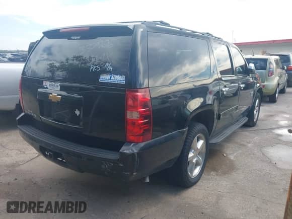 2013 Chevrolet Suburban LT with VIN 1GNSCJE00DR337906, listed as a IAAI auction lot 43466723 with 167,524 mi miles and . Bid and sale history available at DreamBid. Image 4.