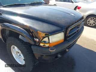 1999 Dodge Dakota SLT z VIN 1B7GG22X3XS172411, wystawiony jako IAAI lot #43433051 z przebiegiem 200 417 mil mil oraz . Historia ofert i sprzedaży dostępna na DreamBid. Obrazek 6.