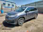 2020 Honda Pilot Elite z VIN 5FNYF6H02LB032625, wystawiony jako Copart lot #69782685 z przebiegiem 68 084 mil mil oraz Czysty tytuł • Clean title. Historia ofert i sprzedaży dostępna na DreamBid. Obrazek 1.