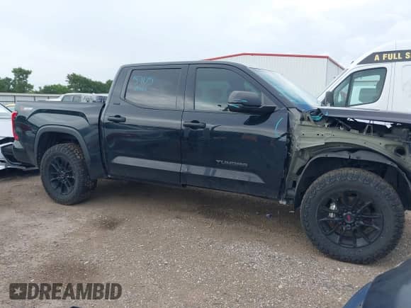 2022 Toyota Tundra SR5 with VIN 5TFLA5DB3NX045791, listed as a IAAI auction lot 42661779 with 61,344 mi miles and . Bid and sale history available at DreamBid. Image 14.