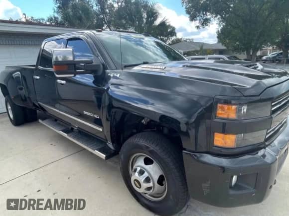 2018 Chevrolet Silverado 3500HD LTZ с VIN 1GC4K0EY3JF145008, выставлен на аукционе Copart как лот 53173945 с пробегом 375 045 миль миль и Чистый • Clean title. История ставок и продаж доступна на DreamBid. Изображение 1.