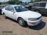 1994 Toyota Camry LE z VIN 4T1SK12C1RU432937, wystawiony jako IAAI lot #43004501 z przebiegiem 210 134 mil mil oraz . Historia ofert i sprzedaży dostępna na DreamBid. Obrazek 1.