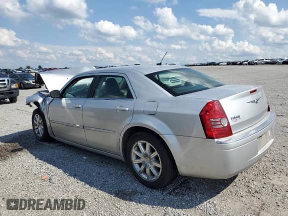 2008 Chrysler 300 Limited with VIN 2C3KA33G48H258419, listed as a Copart auction lot 68926595 with 152,976 mi miles and Salvage title. Bid and sale history available at DreamBid. Image 2.