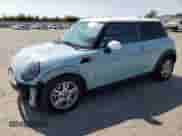 2011 MINI Hardtop with VIN WMWSU3C52BT096248, listed as a Copart auction lot 62008285 with 129,794 mi miles and Salvage title. Bid and sale history available at DreamBid. Image 1.