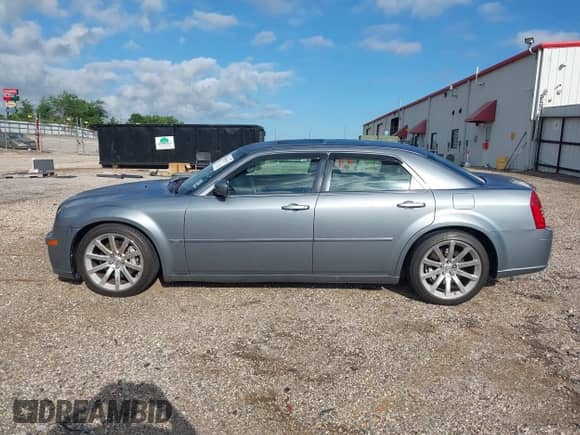 2006 Chrysler 300 C SRT-8 with VIN 2C3LA73W66H523504, listed as a IAAI auction lot 42483103 with 61,560 mi miles and . Bid and sale history available at DreamBid. Image 12.